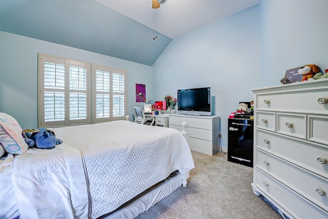 bedroom featuring vaulted ceiling, fridge, and light colored carpet