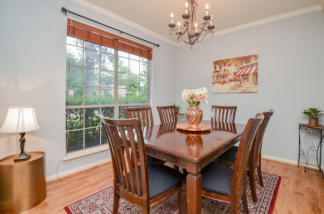 dining space featuring an inviting chandelier, light wood finished floors, and a healthy amount of sunlight