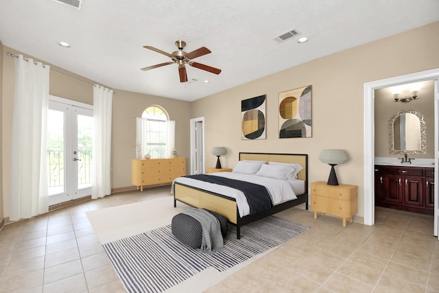 1321 E Archer Rd, Baytown, TX 77521 - bedroom featuring visible vents, light tile patterned floors, french doors, and access to exterior