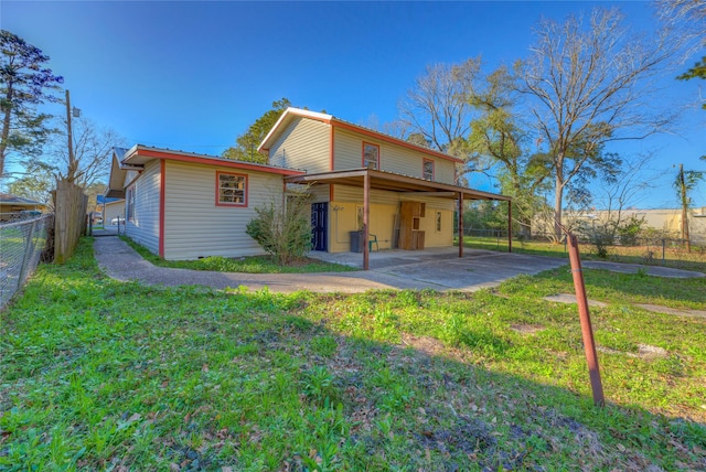 back of property featuring a patio, a fenced backyard, and a yard