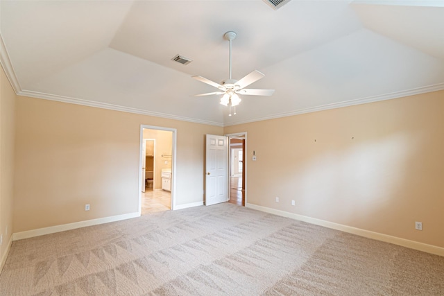 unfurnished bedroom featuring visible vents, baseboards, crown molding, and light carpet