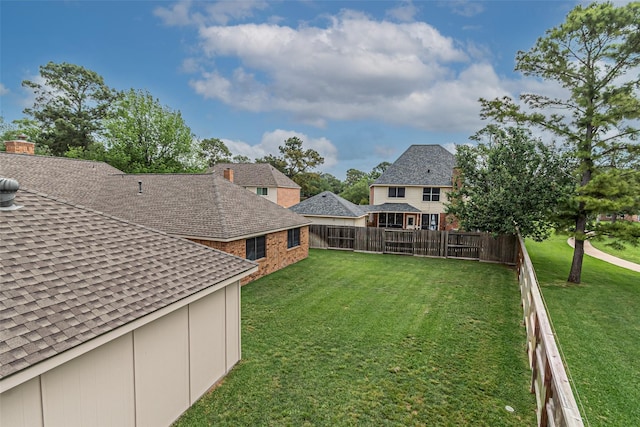 view of yard with fence