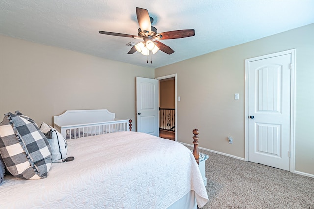 bedroom with carpet floors, baseboards, and ceiling fan