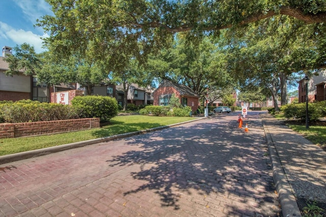 7447 Cambridge St, Houston, TX 77054 - view of front of property featuring a residential view and brick siding