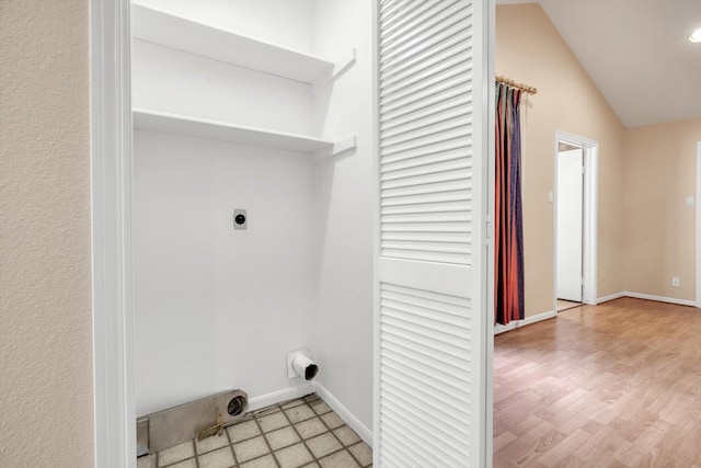 7447 Cambridge St, Houston, TX 77054 - laundry area with electric dryer hookup, baseboards, and recessed lighting