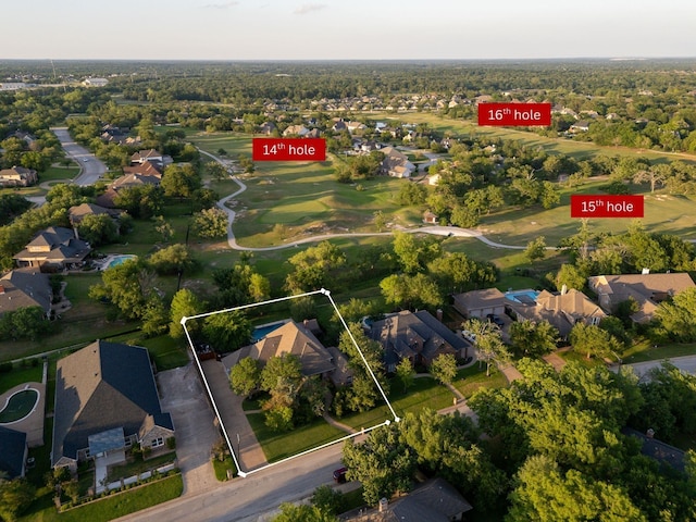 bird's eye view featuring view of golf course and a residential view