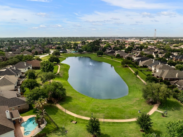 birds eye view of property featuring a water view and a residential view