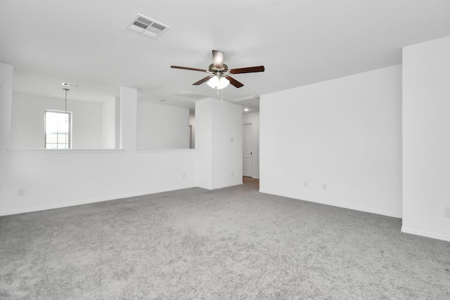 25489 Northpark Spruce Dr, Porter, TX 77365 - carpeted spare room featuring baseboards, a ceiling fan, and visible vents