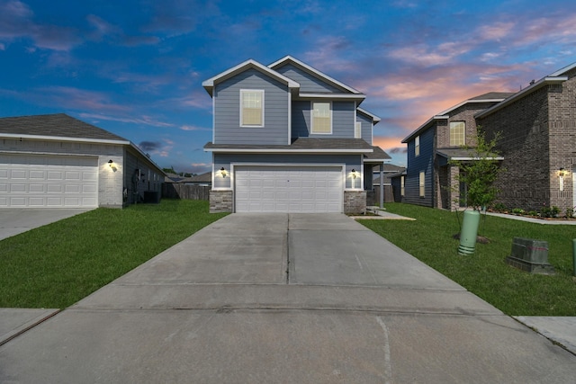 25489 Northpark Spruce Dr, Porter, TX 77365 - view of front of house featuring an attached garage, a yard, and driveway