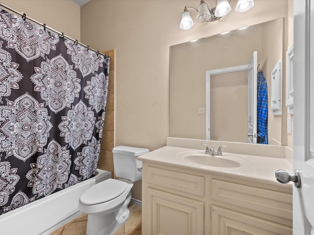 full bath featuring tile patterned floors, vanity, toilet, and shower / tub combo