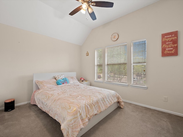 bedroom featuring baseboards, lofted ceiling, ceiling fan, and carpet