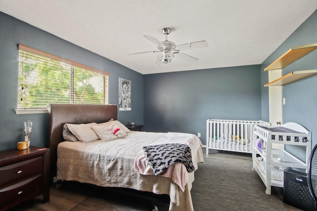 bedroom with ceiling fan and wood finished floors