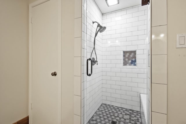 full bathroom featuring a shower stall