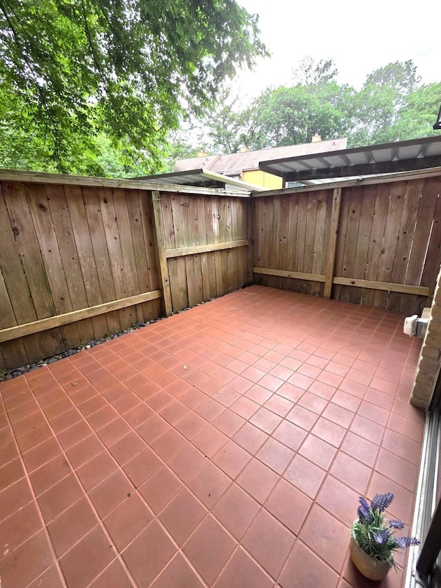 11711 Memorial Dr Unit 97, Houston, TX 77024 - view of patio featuring fence