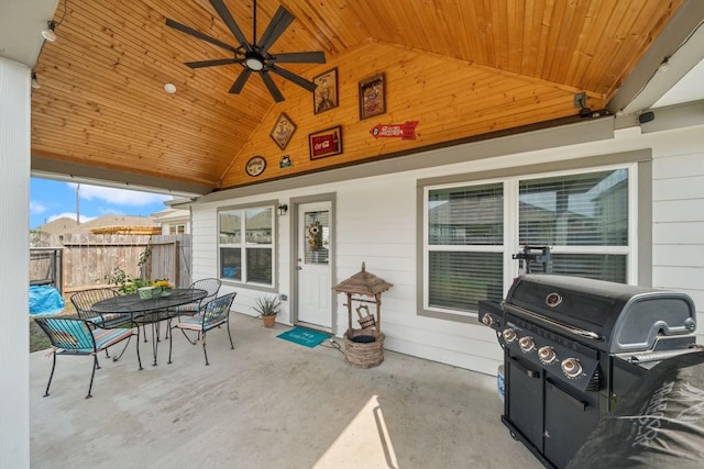 view of patio / terrace featuring fence, a ceiling fan, outdoor dining space, and area for grilling