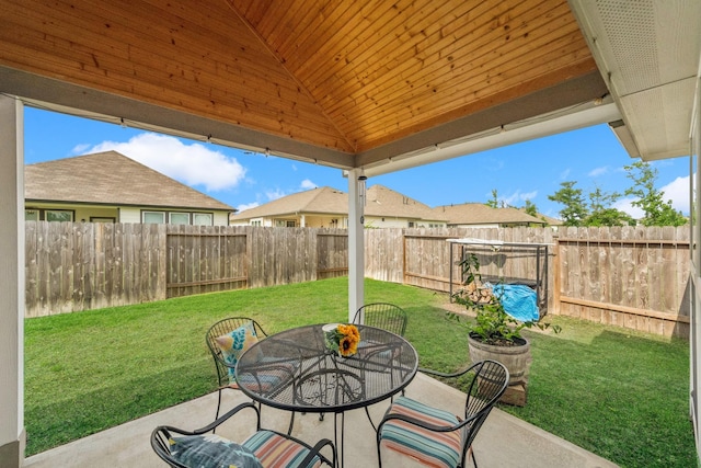 view of patio featuring outdoor dining area and a fenced backyard