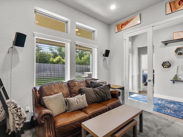 living room with carpet floors, french doors, and recessed lighting