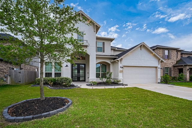 view of front of home featuring fence, stucco siding, french doors, an attached garage, and driveway
