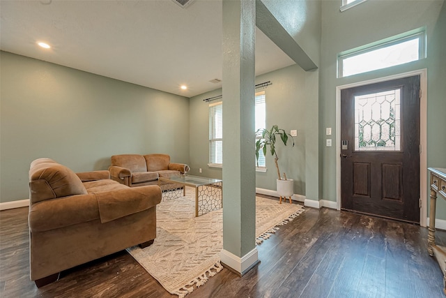 1219 Posey Ridge Trl, Katy, TX 77494 - foyer featuring a healthy amount of sunlight, baseboards, and dark wood-style floors