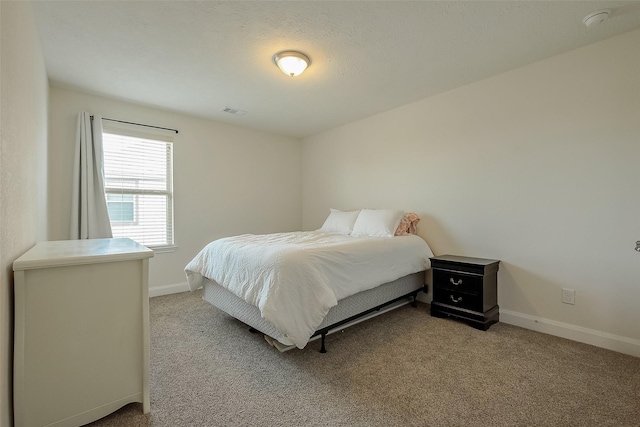 1219 Posey Ridge Trl, Katy, TX 77494 - bedroom with baseboards, carpet flooring, and visible vents