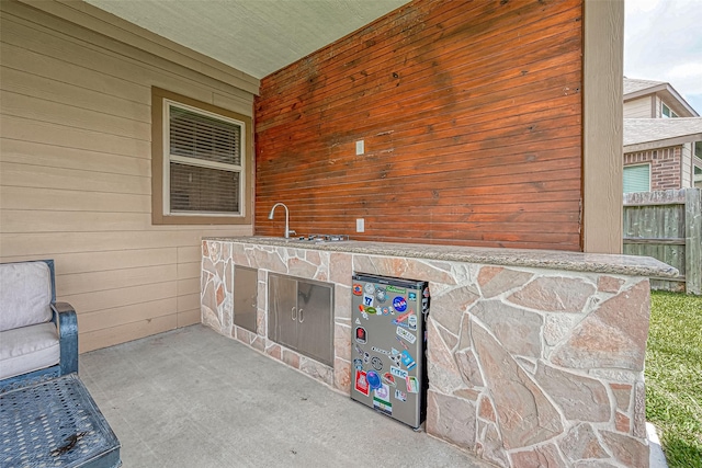1219 Posey Ridge Trl, Katy, TX 77494 - view of patio featuring fence