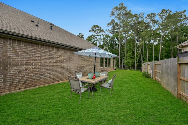 view of yard featuring fence