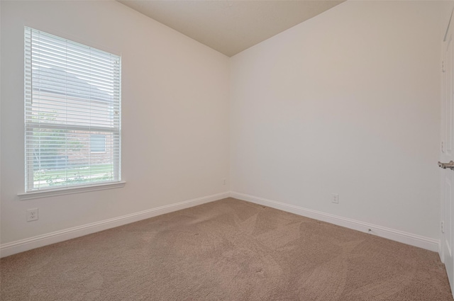 8135 W Pine Creek Bnd, Cypress, TX 77433 - spare room featuring carpet, lofted ceiling, and baseboards