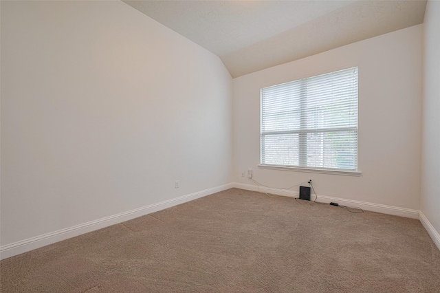 8135 W Pine Creek Bnd, Cypress, TX 77433 - carpeted spare room with baseboards and vaulted ceiling