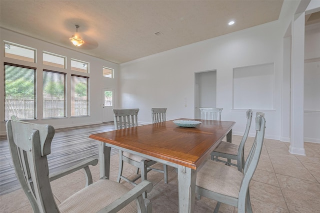 dining area with crown molding, baseboards, and recessed lighting