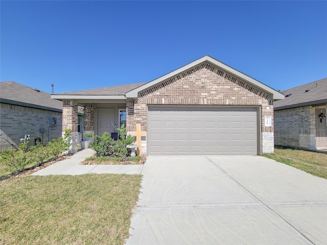 ranch-style home featuring an attached garage, driveway, a front lawn, and brick siding