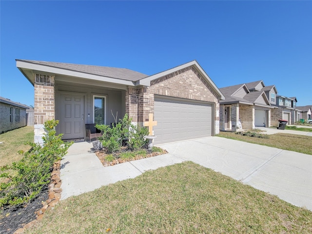 single story home featuring a garage, concrete driveway, a front lawn, and brick siding