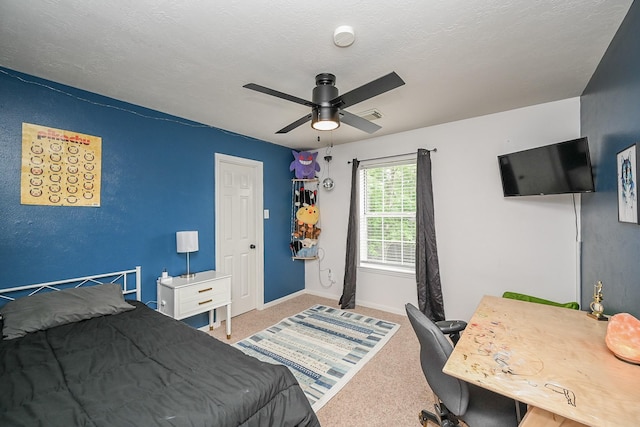 bedroom featuring baseboards, a ceiling fan, carpet, and visible vents