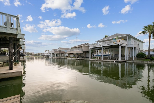 22118 Matagorda Dr, Galveston, TX 77554 - view of dock featuring a water view and boat lift