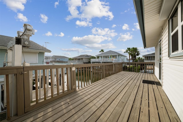 22118 Matagorda Dr, Galveston, TX 77554 - wooden deck with a residential view