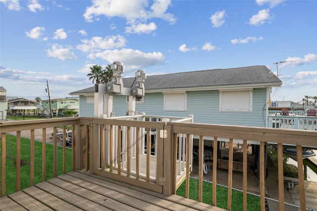 22118 Matagorda Dr, Galveston, TX 77554 - wooden terrace with a yard and a residential view