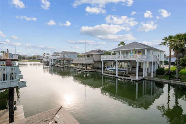 22118 Matagorda Dr, Galveston, TX 77554 - dock area with a residential view, boat lift, and a water view