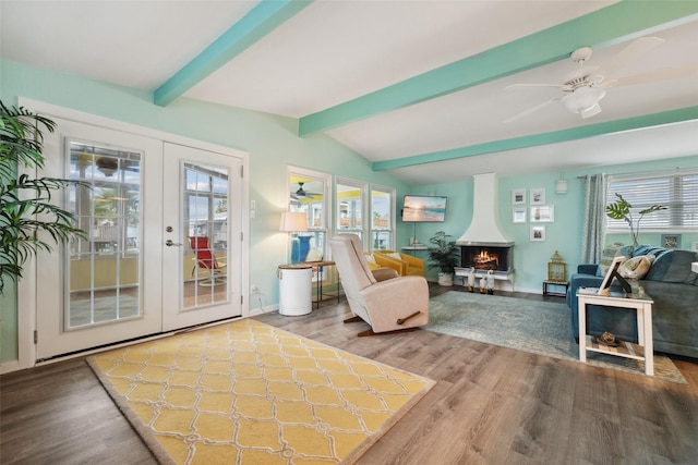 22118 Matagorda Dr, Galveston, TX 77554 - interior space with ceiling fan, lofted ceiling with beams, french doors, and wood finished floors