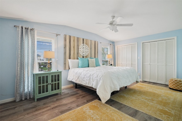 22118 Matagorda Dr, Galveston, TX 77554 - bedroom featuring baseboards, multiple windows, wood finished floors, and lofted ceiling