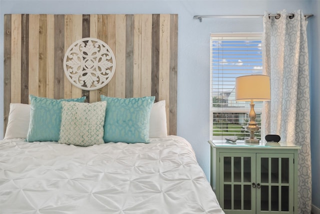 22118 Matagorda Dr, Galveston, TX 77554 - bedroom featuring wooden walls