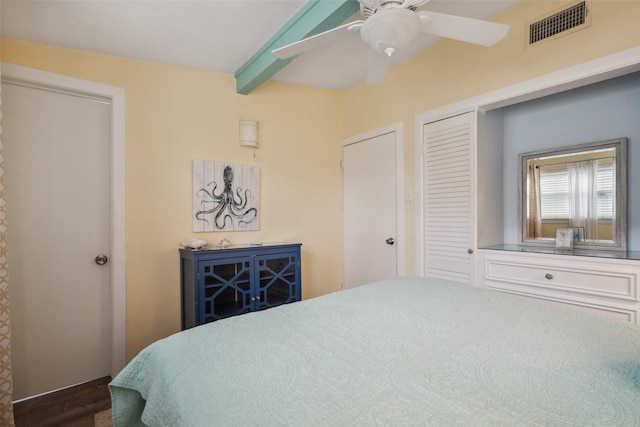 22118 Matagorda Dr, Galveston, TX 77554 - bedroom featuring visible vents, ceiling fan, wood finished floors, and beam ceiling