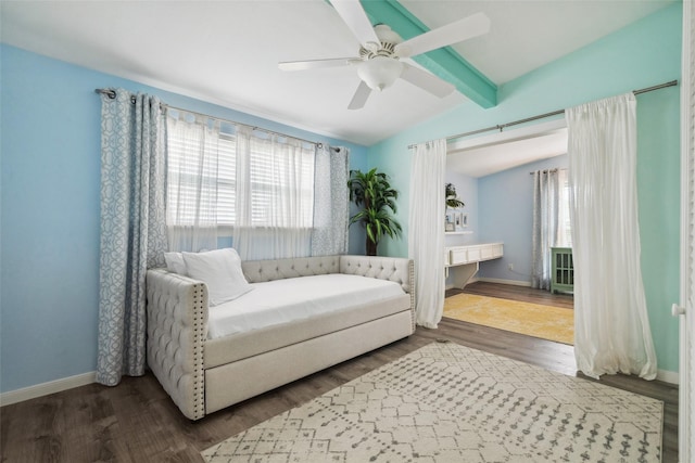 22118 Matagorda Dr, Galveston, TX 77554 - sitting room featuring baseboards, lofted ceiling with beams, dark wood-type flooring, and a ceiling fan