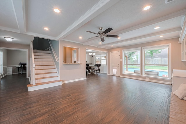 living area with dark wood-style flooring, stairs, beamed ceiling, baseboards, and ceiling fan with notable chandelier