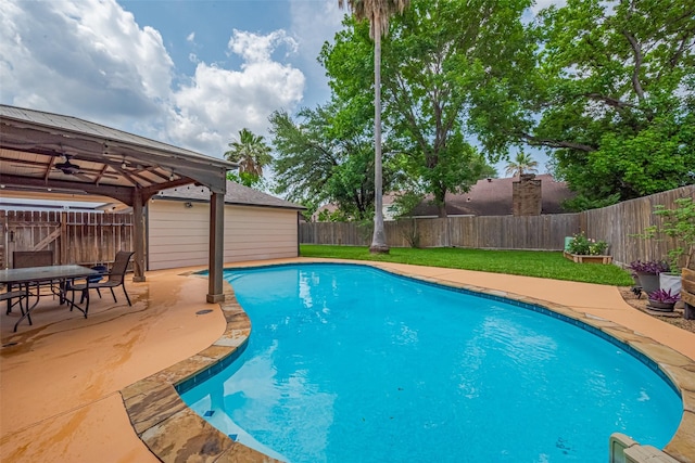 view of pool featuring a fenced in pool, a fenced backyard, a patio area, and a yard