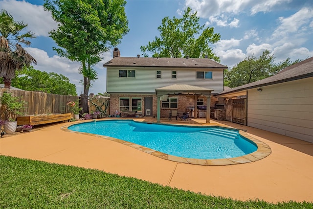 view of pool with a fenced in pool, a patio, a gazebo, and a fenced backyard