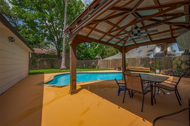 view of pool featuring a gazebo, ceiling fan, a fenced backyard, a fenced in pool, and a patio