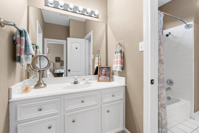 bathroom featuring visible vents, tile patterned flooring, vanity, connected bathroom, and shower / bath combo with shower curtain