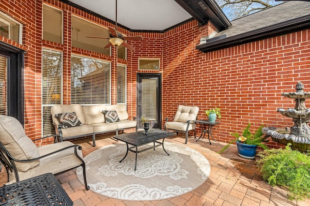 view of patio with a ceiling fan and an outdoor hangout area