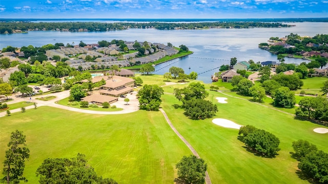 birds eye view of property with a residential view, a water view, and golf course view