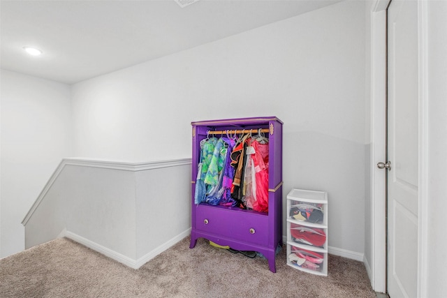 playroom with baseboards and carpet flooring