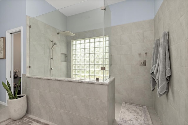 9614 Oconnor Ln, Missouri City, TX 77459 - bathroom featuring a walk in shower and tile patterned floors